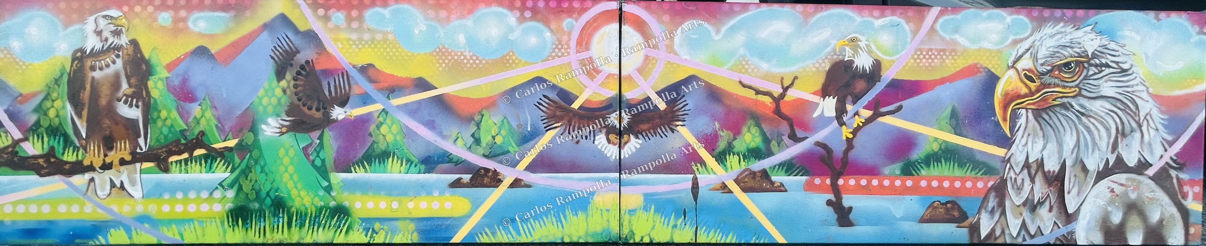 Panoramic view of the mural painting in progress, showing five bald eagles across a colorful mountain and lake landscape.