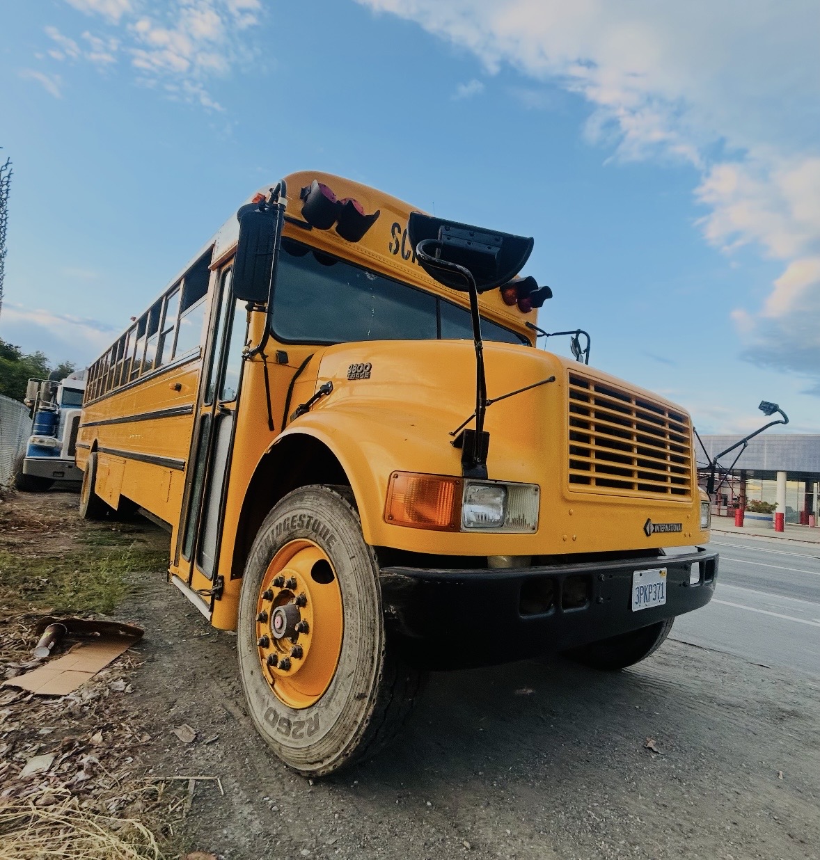 Front view of the yellow school bus for Carlos Rampolla’s Mobile Work Studio.